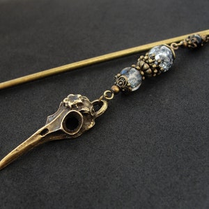 Raven hair stick, bird skull hairpin, white black crackle glass, bronze metal color