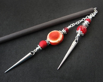 Handmade hair stick with red beads and spikes, dangling ornament