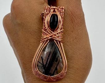 Quartz, onyx, and tourmaline pendant wire wrapped in copper