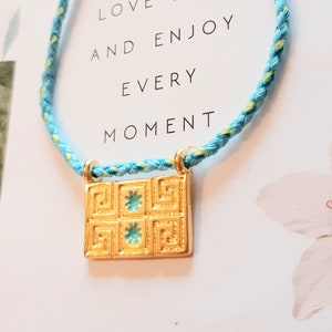 Collana talismano etnica boho, amuleto protettivo, doppio occhio, portafortuna, placcata in oro, regolabile, regalo simbolico.