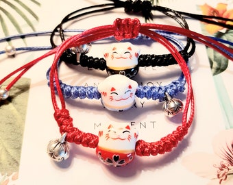 Bracelet porte-bonheur..talisman..petit chat japonais : Maneki-Neko..symbole de protection,chance,bonheur..mignon et délicat..universel.