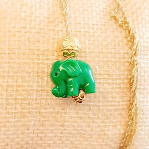 collier éléphant porte-bonheur..amulette animal totem ..trompe en l'air..force,bravoure,longévité..à adopter de 3 à 100 ans..vendu au choix. image 4