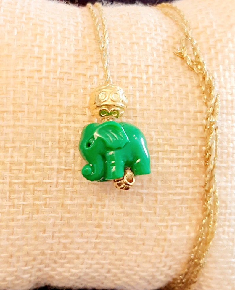 collier éléphant porte-bonheur..amulette animal totem ..trompe en l'air..force,bravoure,longévité..à adopter de 3 à 100 ans..vendu au choix. image 4