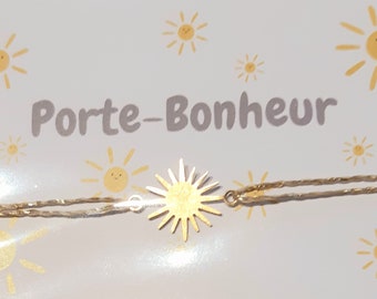 Bracelet soleil porte-bonheur accompagner de sa petite carte à personnaliser..délicat,fin..réglable ttes tailles..prix doux..cordon or.