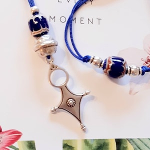 Talisman..grigri..chic ethnic jewelry..Berber..rare African ceramic and silver beads..on adjustable cord all lengths..1 piece