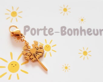 Porte-bonheur pendentif pissenlit..symbole.grigri..à accrocher partout grâce à son mousqueton..délicat,précieux..acier or..trop mignon.