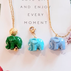 collier éléphant porte-bonheur..amulette animal totem ..trompe en l'air..force,bravoure,longévité..à adopter de 3 à 100 ans..vendu au choix. image 1