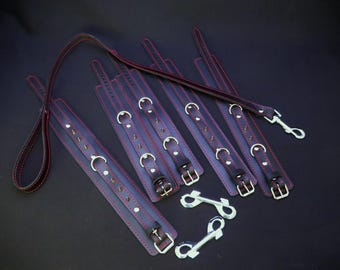Conjunto de sujeción de cuero con collar, esposas y correa – Conjunto de bondage de cuero negro con costuras rojas y pinchos.