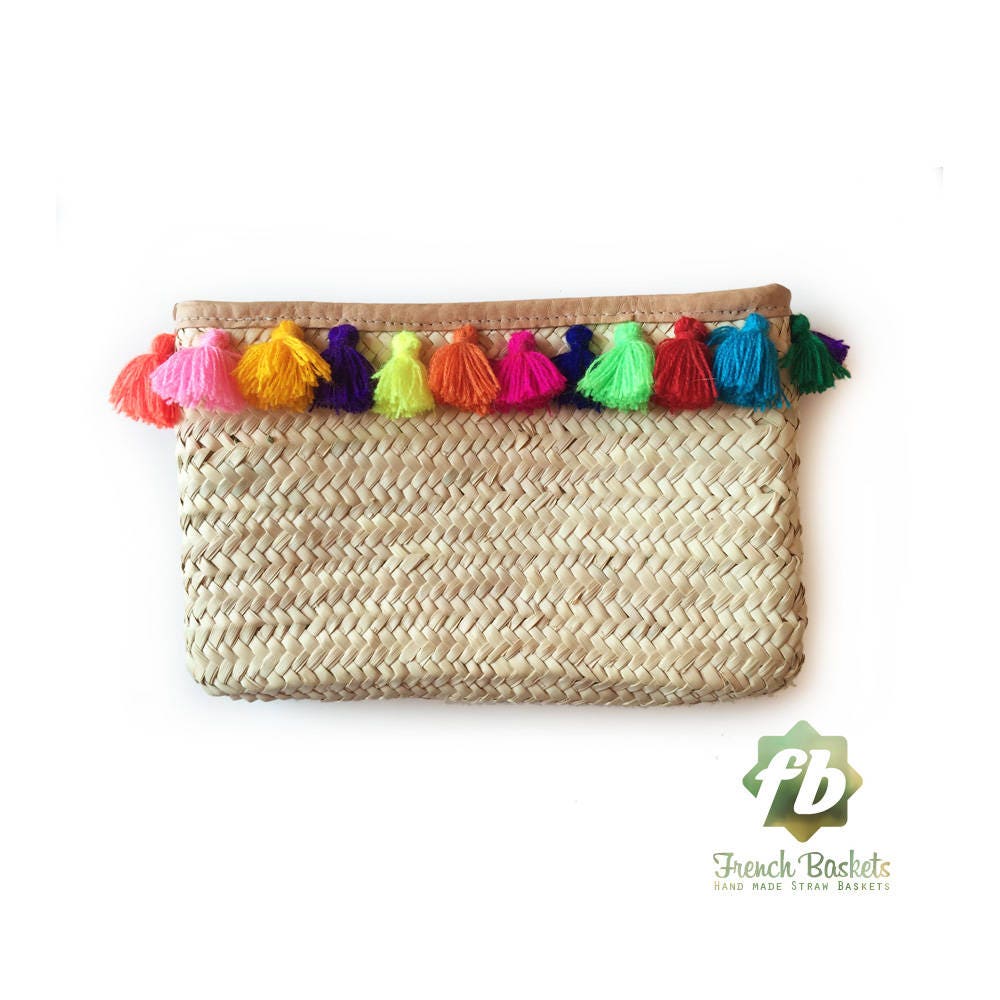 Straw clutch with pom poms deals