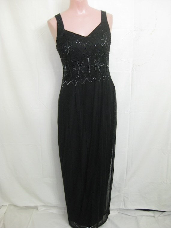 Black gown#007https://www.etsy.com/shop/MsVintageW