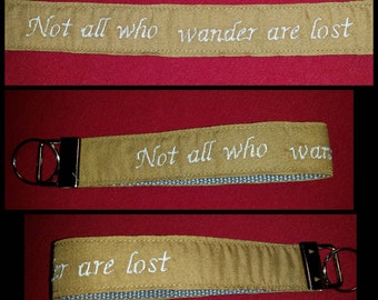 Steampunk wristlet keychain "Not all who wander are lost" embroidered