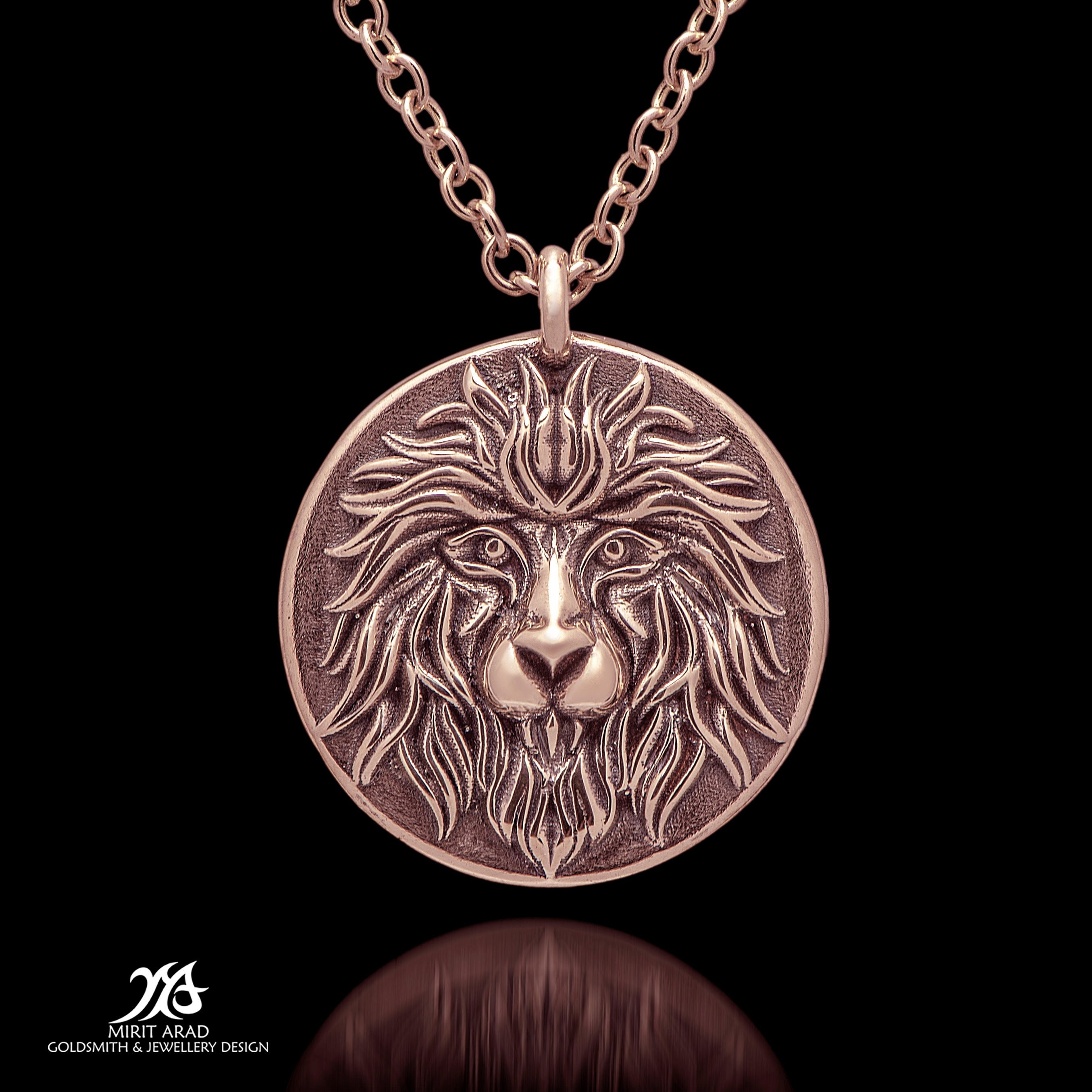 A 14 Karat Rose Gold Lion Head Coin 