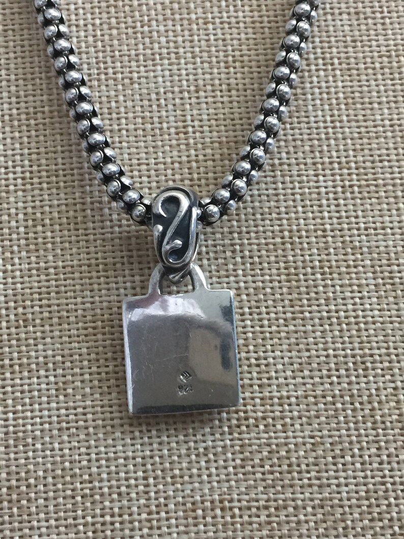Silpada Fleur De Lis Sterling Silver Pendant on Black Leather.
