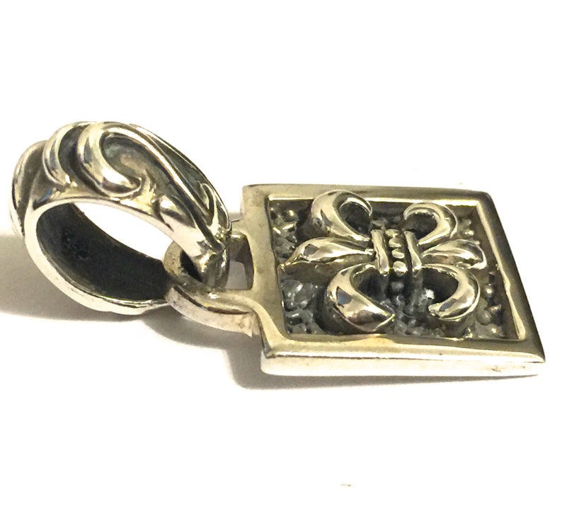 Silpada Fleur De Lis Sterling Silver Pendant on Black Leather.