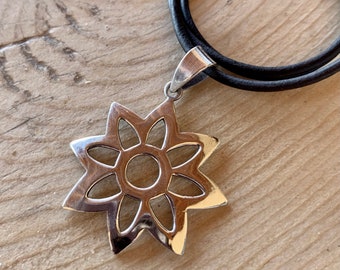 Floral Pendant on Brown Leather Cord. Sterling Silver Die Cut.