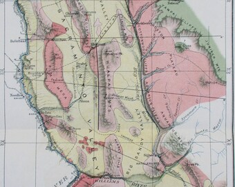 May include: A vintage topographic and geologic sketch map of Western Arizona, featuring detailed geographical information. The map uses a color scheme with shades of pink, green, and beige to represent different geological features and elevations. The map includes text labels and a scale.