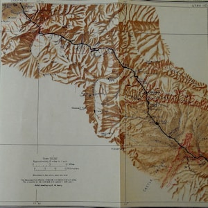 May include: A vintage topographic map of Utah, featuring detailed contour lines and geographical features. The map is printed in shades of brown and tan, with place names and a scale bar. The map shows the area around Price, Utah.