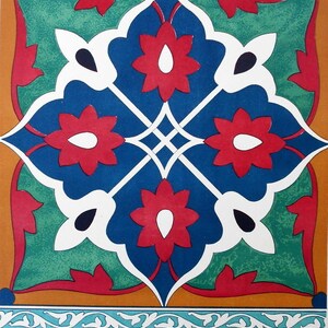 May include: A colorful, geometric tile design featuring a central blue and white floral pattern with red accents. The design is framed by a green and orange border, with a decorative turquoise and white border at the bottom. The image has a vintage aesthetic.