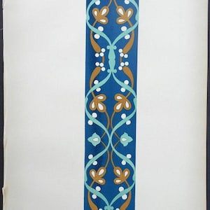 May include: A vertical design on a white background featuring a deep blue rectangle with an intricate pattern. The pattern includes intertwined teal and brown lines, white dots, and stylized floral elements. The design is reminiscent of historical art.
