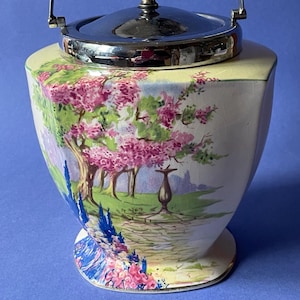 Vintage ceramic biscuit barrel / storage pot by Royal Winton, 'Sundial' design, c1930s.