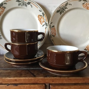 Apilco French vintage Bistro Ware, medium cups and saucers, brown and gold, set of 3, c1980s.