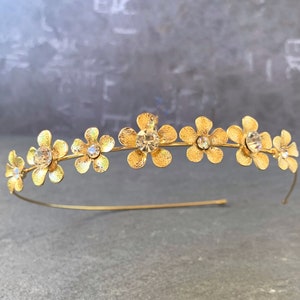 Gold Flower Asymmetrical Headband, May Be Worn In Front Or Back Of Head