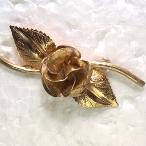 INC Delicate Costume Pin with flower centerpiece
