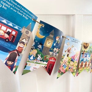 It’s A Small World Disney book page banner party decor bunting garland Disney world land