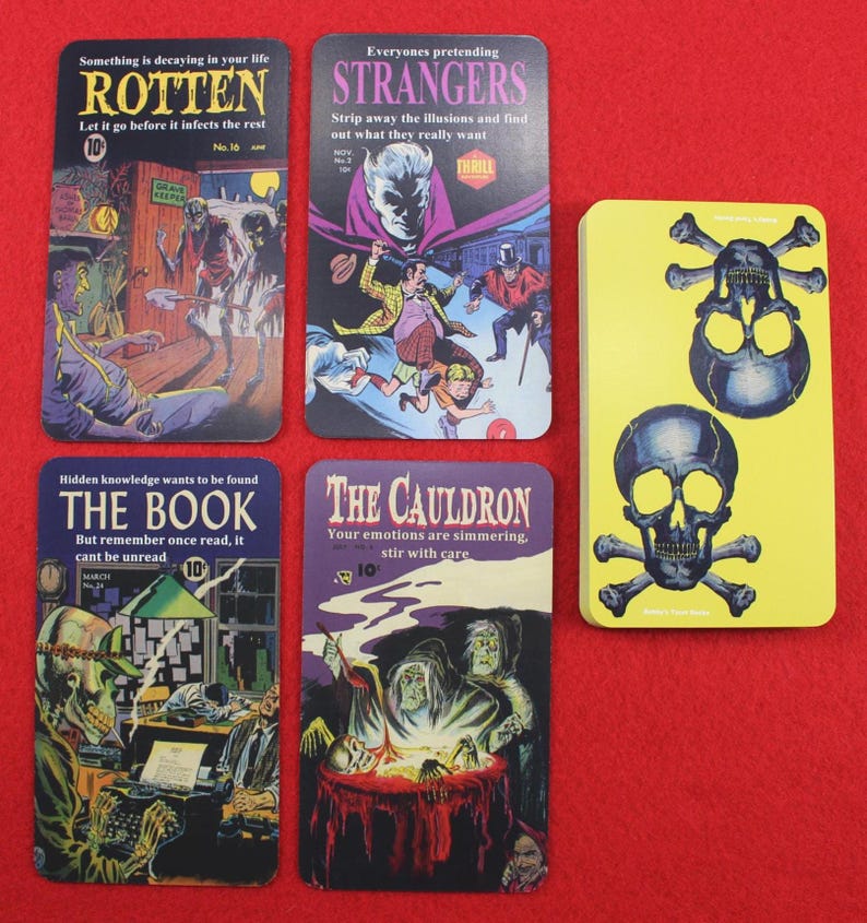 May include: A collection of vintage-style coasters with horror comic book art. The coasters feature images of zombies, a cauldron, and skulls. Each coaster has a unique title and text, with a yellow coaster featuring two skulls and crossbones.