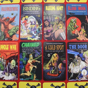 May include: A collection of vintage-style tarot cards with horror-themed illustrations and titles like "Awakening," "Binding," and "Blood Moon." Each card features unique artwork and text, set against a red background with skull and crossbones.