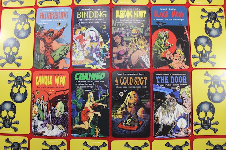 May include: A collection of vintage-style tarot cards with horror-themed illustrations and titles like "Awakening," "Binding," and "Blood Moon." Each card features unique artwork and text, set against a red background with skull and crossbones.