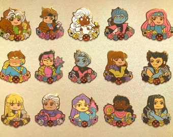 May include: Set of 16 colorful enamel pins featuring cartoon characters with floral accents. Each pin features a different character with unique details and expressions.