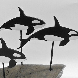 Fork Art Orca pod on driftwood base