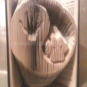 Paw and hand ying yang book folding pattern