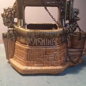 Vintage McCoy Wishing Well planter.