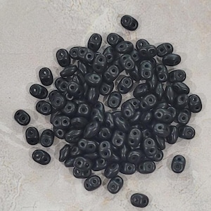 SuperDuo, Matte Metallic Black, 2 hole Beads, (duo502010-29400), 2.5mmx5mm, 9 grams