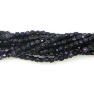 May include: Close-up of multiple strands of dark purple faceted beads. The beads have a reflective surface, catching the light. The beads are strung together, creating a textured, layered effect. Each bead is approximately 0.4 cm in diameter.