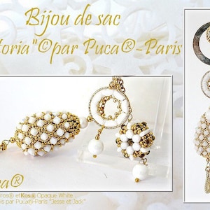 May include: A white and gold beaded bag charm with the text "Bijou de sac "Victoria" Opar Puca®-Paris" and "Puca® Kalos ®, Piros® et Kos® Opaque White Support Bois par Puca®)-Paris "Jesse et Jack""