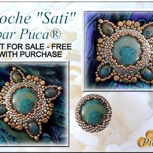 May include: A turquoise and gold beaded brooch with the text "Broche "Sati" par Puca® NOT FOR SALE - FREE WITH PURCHASE"