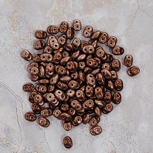 SuperDuo Metalust Burnt Copper, 2 hole Beads, (duo523980-24201), 2.5mmx5mm, 9 grams