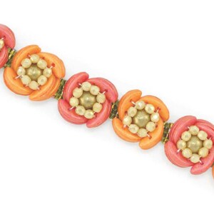 May include: A bracelet made of orange and pink beads with gold accents. The beads are arranged in a flower shape.