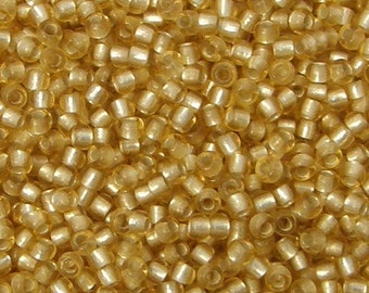 Toho 11/o Silver Lined Light Topaz Matte Seed Beads (TR-11-22F), choice of 10 grams or 23 grams