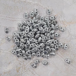 SuperDuo, Silver, 2 hole Beads, (27000), 2.5mmx5mm, 9 grams