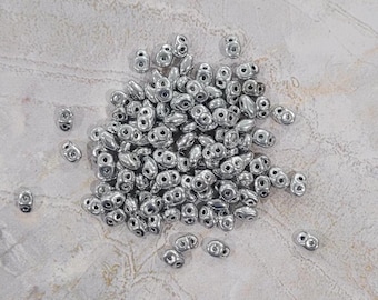 SuperDuo, Silver, 2 hole Beads, (27000), 2.5mmx5mm, 9 grams