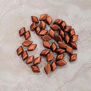 MINI GemDuo Beads, Bronze Fire Red, 50 count, 6 x 4 mm 2-Hole Czech Bead, (GD-64-00030-01750)