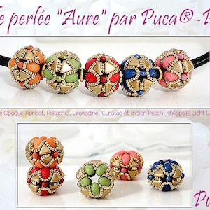 May include: Image of beaded jewellery with the text "Perle perlée 'Aure' par Puca®-Paris". The beads are in shades of orange, green, red, blue, and pink, with gold details. The beads are strung on a black cord.