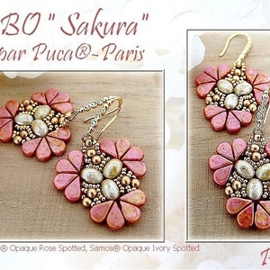 May include: A pair of pink and gold beaded earrings with a flower design. The earrings are labeled "BO "Sakura" par Puca®-Paris" and "Amos® Opaque Rose Spotted, Samos® Opaque Ivory Spotted".