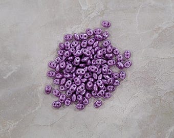 SuperDuo, lilas nacré, perles 2 trous, (duo525012), 2,5 mm x 5 mm, 9 g