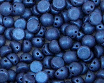 May include: A collection of metallic blue beads. The beads are flat-backed, round, and have two holes for stringing. The beads have a slightly textured surface and a matte finish. These beads are suitable for jewelry making and crafts.