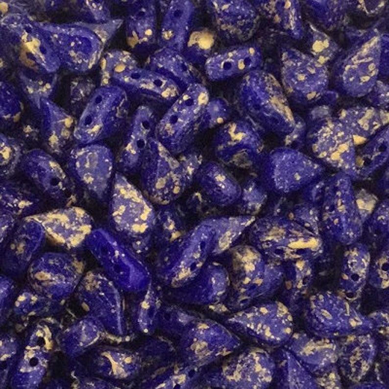 30 count 5 x 8 mm Opaque Sapphire Splash 2-Hole Amos\u00ae par Puca\u00ae Bead